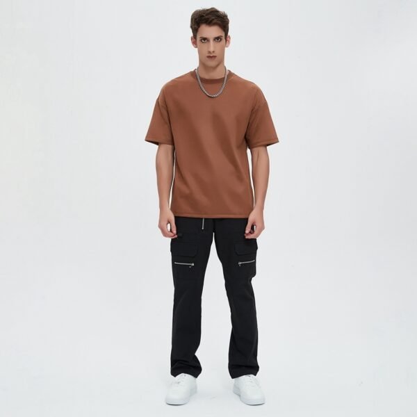Custom Color-Block Seamed Oversized Short-Sleeve Sweatshirt - Style AC70BD Man wearing a brown oversized short-sleeve sweatshirt