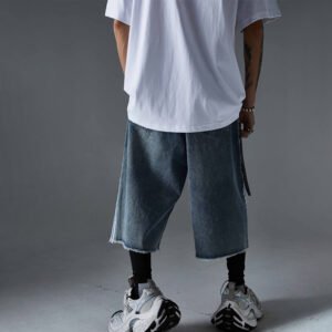 Washed denim long shorts with distressed hem and white stripe