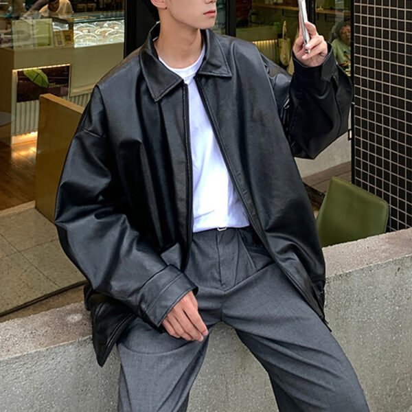 Oversized black leather-look zip front coat