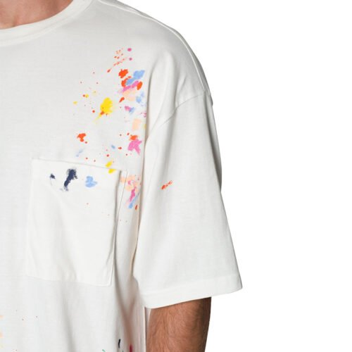 Custom white t-shirt with colorful paint splatter design and pocket
