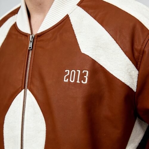 Custom Paneled Bomber Jacket with 3D Chest Embroidery - VW-29D961E8 - Style 29D961 Close-up of a brown and white paneled bomber jacket with '2013' embroidery