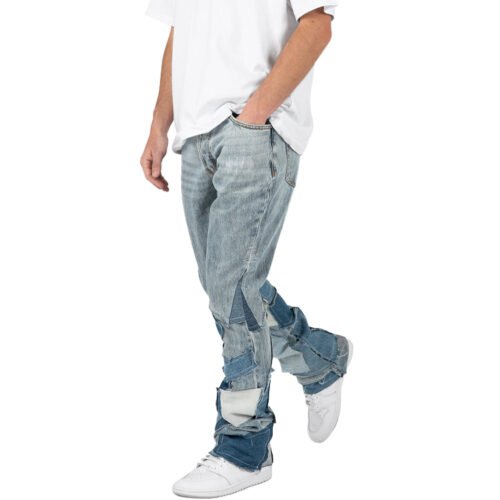Man wearing light wash custom baggy straight patchwork jeans