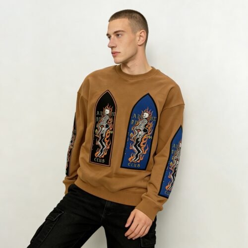 Custom Patchwork Skeleton Graphic Crewneck Sweatshirt - Style FA7636 Brown crewneck sweatshirt with patchwork skeleton and flame graphics