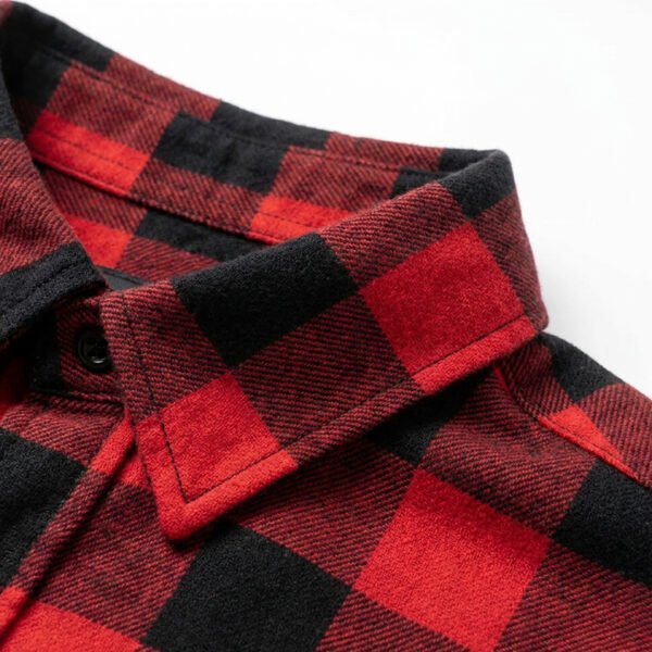 Close-up of a red and black plaid shirt collar