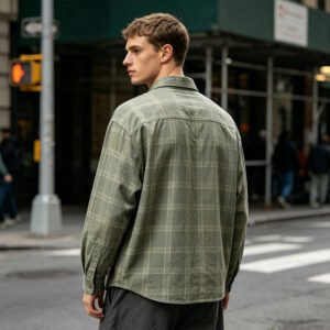 Man wearing a vintage green plaid long sleeve overshirt