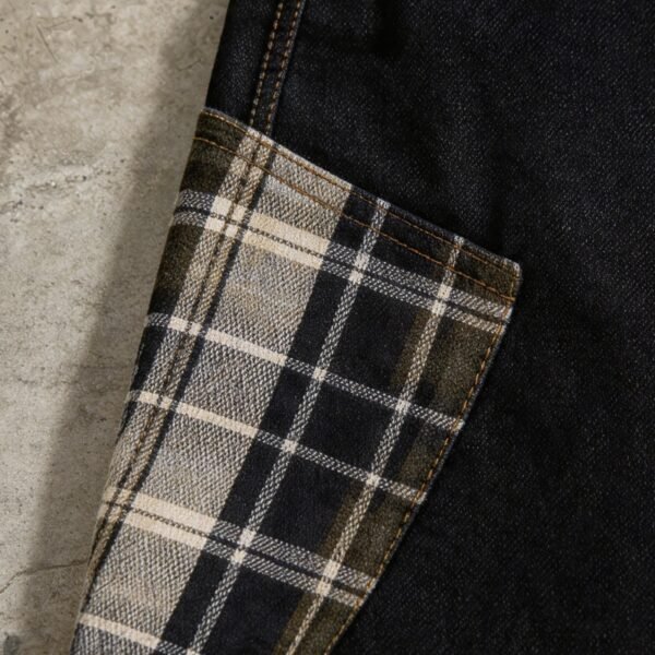 Dark wash denim capri jeans with plaid patchwork detail.