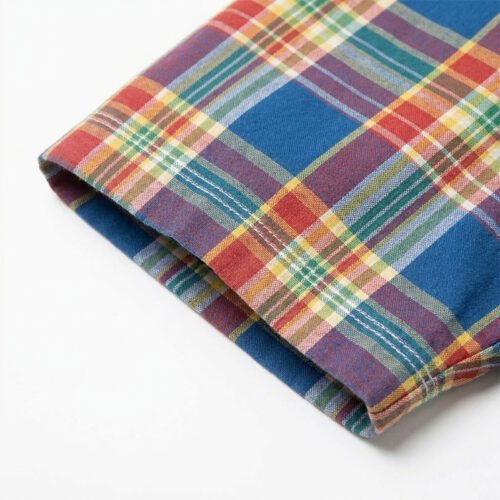 Custom Plaid Pocket Utility Shorts - Style 0F85CC Close-up of multicolored plaid shorts fabric
