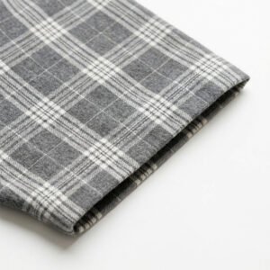 Close-up of grey plaid fabric on shorts