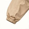 Custom Quarter-Zip Color-Block Jacket | - Style 48A560 Close-up of a tan jacket sleeve with an elastic cuff