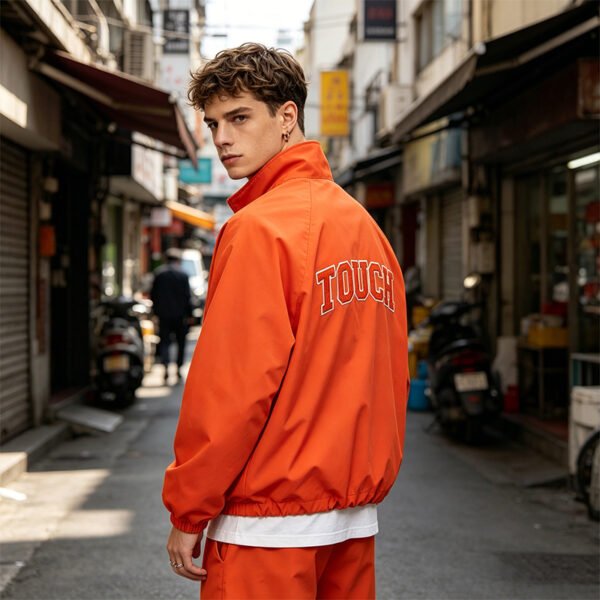 Custom Orange Quarter-Zip Windbreaker VW-F2CC - Style F2CC5C - product detail view 3 Custom Orange Quarter-Zip Windbreaker VW-F2CC - Style F2CC5C - product detail view 3