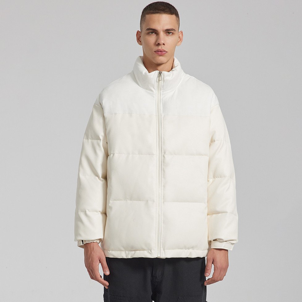 Man wearing a white quilted stand-collar winter coat