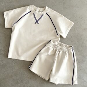 Cream t-shirt and shorts set with navy contrast piping