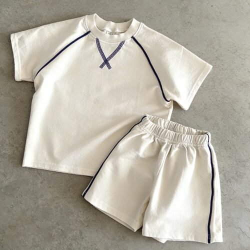Cream t-shirt and shorts set with navy contrast piping
