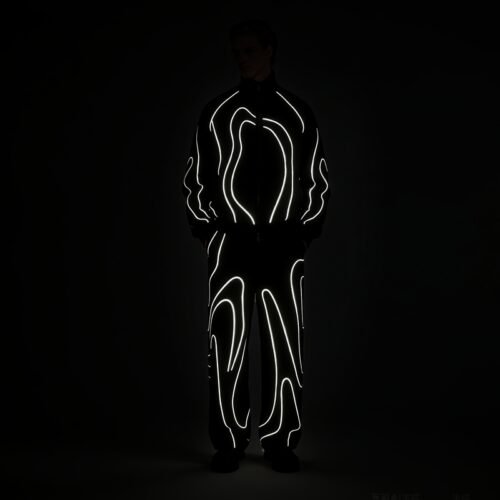 Black tracksuit with glowing reflective piping in the dark