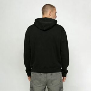 Man wearing a black pullover hoodie from behind