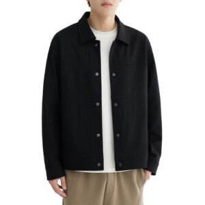 Custom black relaxed lapel workwear jacket with button-up front and chest pockets.