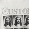 Custom rhinestone crop t-shirt with repeated religious imagery.
