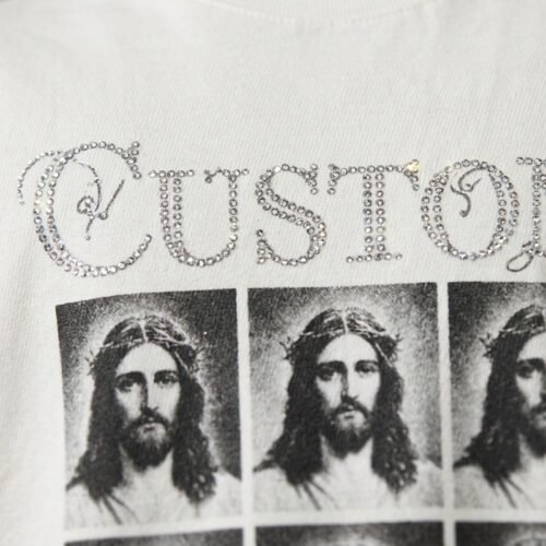 Custom Rhinestone Graphic Crop T-Shirt - Style 0DB980 Custom rhinestone crop t-shirt with repeated religious imagery.