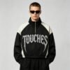 Black and white color-block crop jacket with rhinestone text