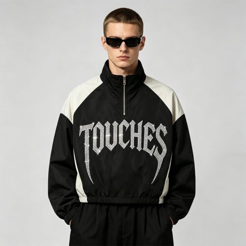 Custom Rhinestone Color-Block Half-Zip Crop Jacket - Style E8D156 Black and white color-block crop jacket with rhinestone text