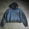 Blue and black cropped hoodie with rhinestone star spray-dye effect