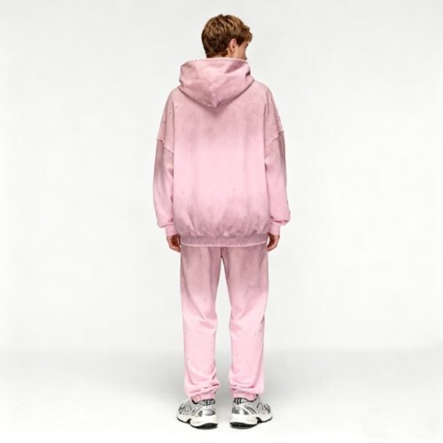 Custom Vintage Spray Rhinestone Pullover Hoodie - Style 6A2FF9 Man wearing a pink ombre hoodie and sweatpants set
