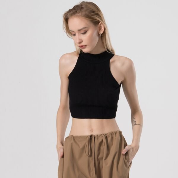 Custom Ribbed Mock-Neck Crop Tank Top - Style DC679C Woman wearing a black ribbed mock-neck crop tank top