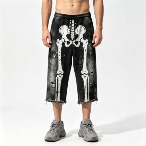 Black distressed capri pants with a white skeleton graphic.