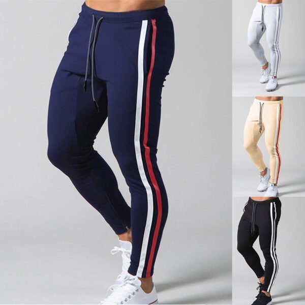 Man wearing custom skinny navy track pants with side stripes