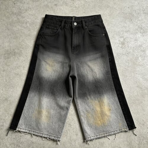 Custom spray-fade denim capri jeans with raw hem and color block detail