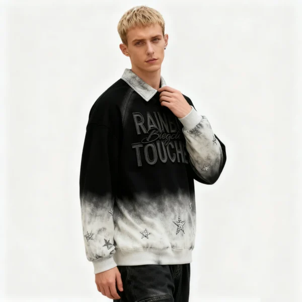Man wearing a spray-wash collared pullover with 'RAINBOW BLEACH TOUCH' graphic
