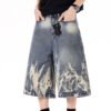 Custom Cropped Sun-Faded Denim Jeans - Style 413578 Sun-faded cropped wide-leg denim jeans with distressed detailing