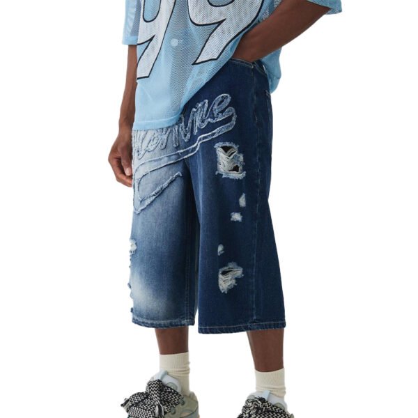 Custom Two-Tone Distressed Denim Long Shorts - Style 8FA65F Man wearing custom two-tone distressed denim shorts with patchwork