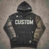 Custom Two-Tone Distressed Graphic Pullover Hoodie - Style BB102D A black and olive green distressed hoodie with the word CUSTOM printed on the front.