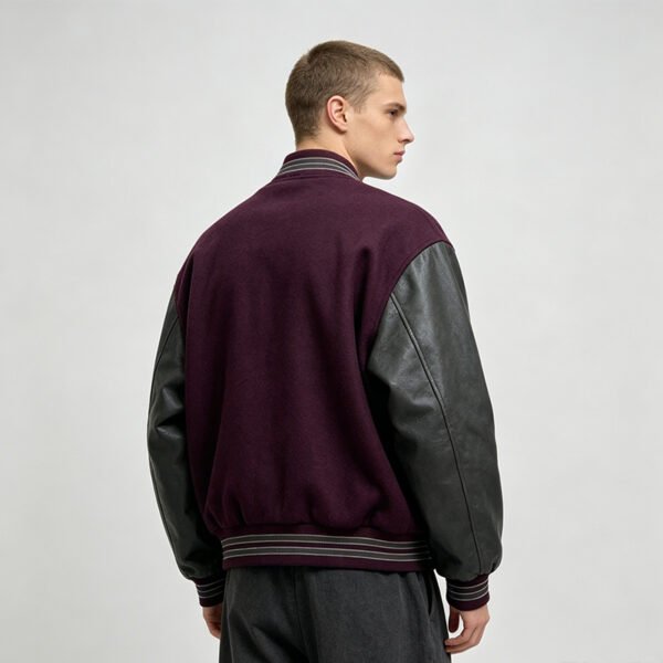Custom Two-Tone Varsity Jacket - Style 72BBD1 Man wearing a burgundy and black varsity jacket