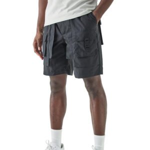 Man wearing black utility cargo shorts with buckle detail