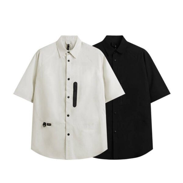 Two short-sleeve utility shirts, one cream and one black