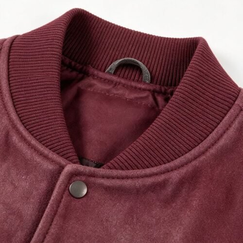 Custom Vintage Snap Front Varsity Jacket - Style 8464DE Close-up of a maroon varsity jacket collar and snap front.