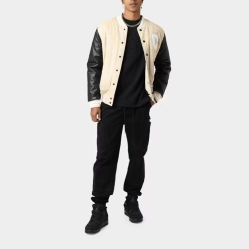 Custom Contrast Sleeve Varsity Jacket - Style D55373 Cream and black contrast sleeve varsity jacket with letter R patch