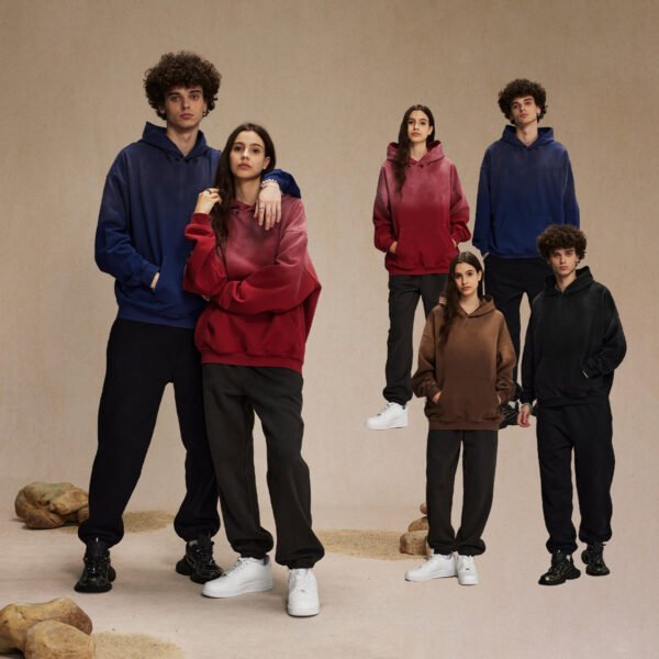 Models wearing custom terry cloth vintage wash distressed pullover hoodies and sweatpants.