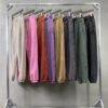 Assorted vintage wash fleece jogger sweatpants hanging on a rack