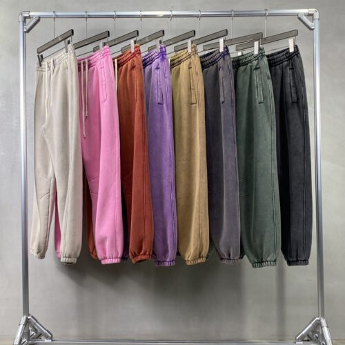 Custom Vintage-Wash Fleece Sweatpants 7763 - Style 2EB288 Assorted vintage wash fleece jogger sweatpants hanging on a rack