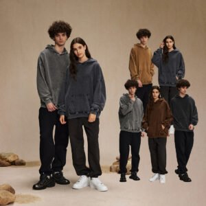 Models wearing oversized vintage wash french terry pullover hoodies and sweatpants sets in various colors.