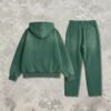 Green vintage washed hoodie and jogger set, shown from the back.