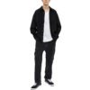 Custom Washed Black Wide-Leg Cargo Jeans - Style DCBB63 Man wearing black washed custom cargo jeans and a black shirt