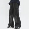 Dark wash washed cargo workwear jeans with utility pockets