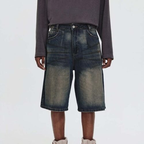 Man wearing vintage washed relaxed fit denim shorts