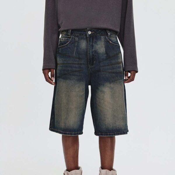 Man wearing vintage washed relaxed fit denim shorts