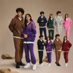 Models wearing oversized washed distressed zip-up hoodies and sweatpants sets in various colors.