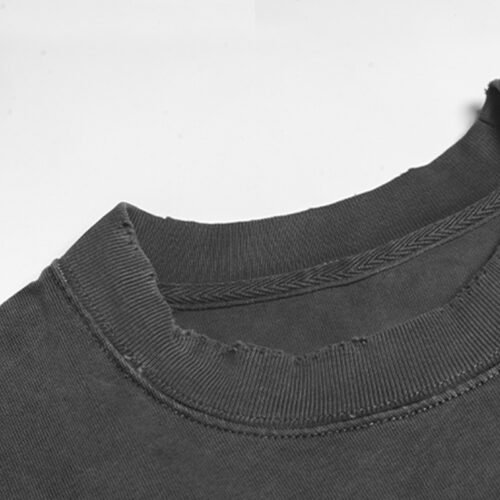 Custom 320 GSM Washed Graphic T-Shirt | VW-8728 - Style 8728CE Close-up of the neckline of a dark grey washed graphic t-shirt.